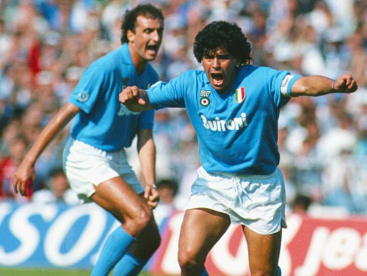 Napoli SSC player Diego Maradona (r) celebrates a goal during an Italian League match between Napoli SSC and AC Milan at San Paolo Stadium in Naples, Italy. (Image Source: Getty Images)