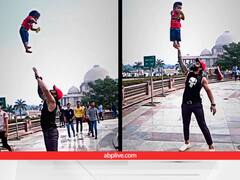 मासूम के साथ खतरनाक स्टंट दिखाते पिता का वीडिओ वायरल, पब्लिक भड़ककर बोली- ये कैसा बाप है..!