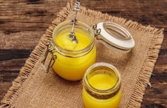 Ghee: রোজ কতটা ঘি খেলে তা স্বাস্থ্যের ক্ষতি করবে না?