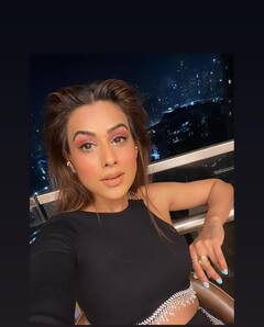 Nia Sharma ने ऑल ब्लैक लुक में फिर बिखेरा हुस्न का जलवा, फोटोज ने लगाई सोशल मीडिया पर 'आग'