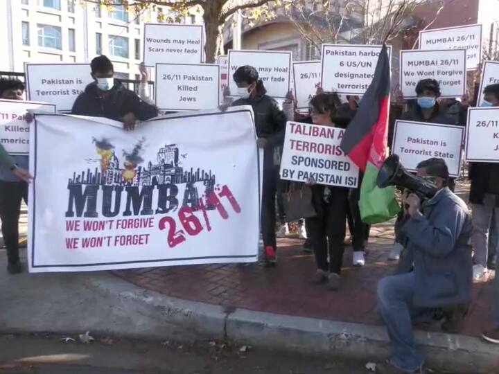 People demonstrated outside Pakistan Embassy in Washington DC against the 26/11 Mumbai Terror Attack.  The 26/11 attacks were a series of 12 coordinated shooting and bombing attacks carried out by 10 Pakistan-based Lashkar-e-Taiba (LeT) terrorists. (Source: ANI)