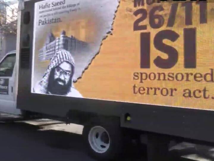 Truck outside Pakistan Embassy in Washington DC with the banner that reads 