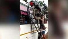 Viral Video: ਵਿਅਕਤੀ ਨੇ ਸਿਰ 'ਤੇ ਰੱਖਿਆ ਮੋਟਰਸਾਇਕਲ, ਬਿਨਾਂ ਫੜੇ ਬੱਸ 'ਤੇ ਚੜ੍ਹ ਗਿਆ, ਲੋਕਾਂ ਨੇ ਕਿਹਾ- ਇਹ ਹੈ ਅਸਲੀ ਬਾਹੂਬਲੀ...