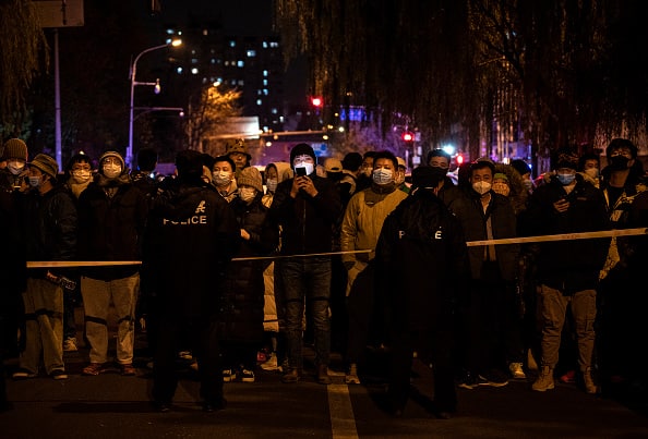 China has experienced an alarming increase in cases in recent days, including a 24-hour high of nearly 40,000 on Saturday, forcing authorities to impose stringent restrictions in accordance with the country's contentious zero-Covid policy, even as the rest of the world tries to coexist with the coronavirus. (Image Source: Getty)