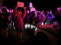 China Protest: चीन में लगातार बढ़ रहे हैं कोरोना केस, पाबंदियों के खिलाफ आखिर व्हाइट पेपर लेकर क्यों प्रदर्शन कर रहे हैं लोग?