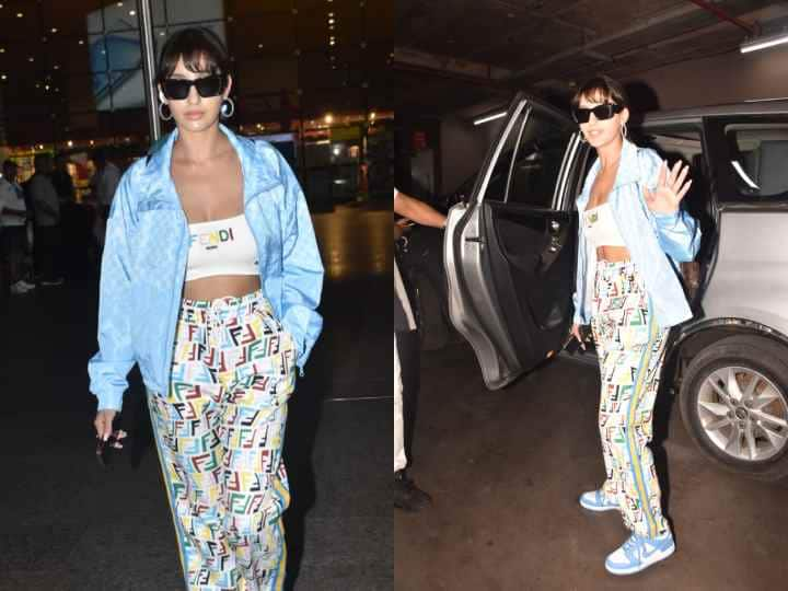 Nora Fatehi Spotted: फीफा वर्ल्ड कप में परफॉर्म करने के बाद बॉलीवुड एक्ट्रेस नोरा फतेही मुंबई वापस लौट आई हैं. हाल ही में मीडिया ने नोरा को एयरपोर्ट पर स्पॉट किया है.