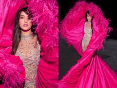 Nora Fatehi Pics: ट्रांसपेरेंट गाउन पर नोरा फतेही ने पहना ड्रामैटिक श्रग, लोग बोले- 'शादी का टेंट क्यों ओढ़ लिया'