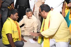 In Pics : నేలపై కూర్చొని దివ్యాంగుడి సమస్య తెలుసుకున్న చంద్రబాబు