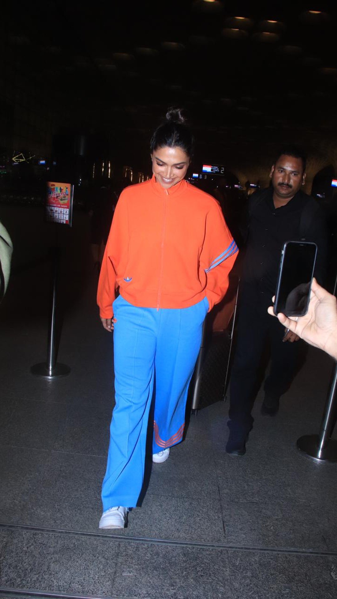 Deepika Padukone Chooses A Comfy Yellow & Blue Adidas Airport Look