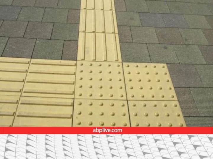 yellow colored tiles on the floor of metro stations are for handicapped persons facilities for disabled amd handicapped persons on metro stations मेट्रो स्टेशन के फर्श पर क्यों लगी होती हैं पीले रंग की टाइल्स? डिजाइन से नहीं है लेना देना
