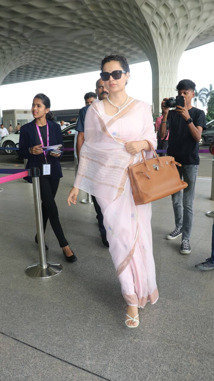 The actress completed her look with pearl jewellery and amped up her style with stylish sunglasses.