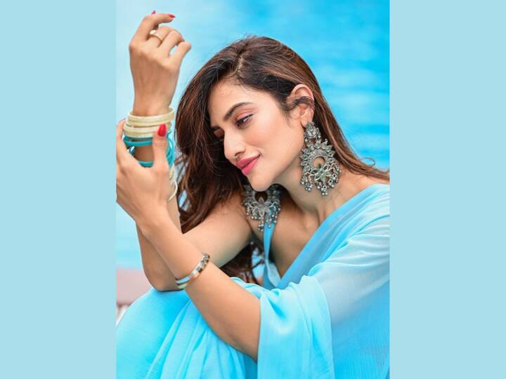 This light blue saree also looks wonderful on the actor. She has paired her outfit with stunning earrings and matching bangles. (Image Source: Instagram)