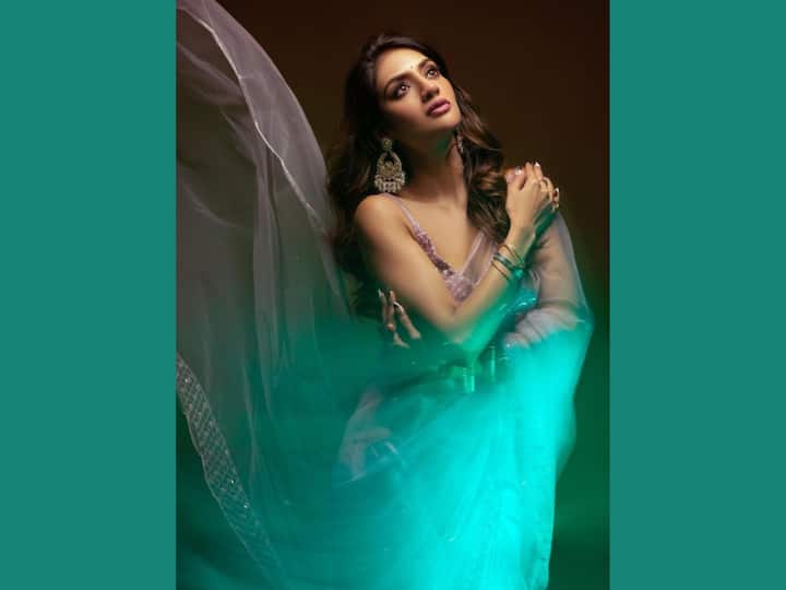 This time, Nusrat has added a different charm altogether to her ethnic look in a light- coloured saree with a strappy blouse. (Image source: Instagram)