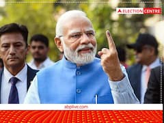 PM Modi Images: गुजरात में मतदान के दौरान सफेद कुर्ता-पायजामा और नीले रंग की जैकेट में नजर आए पीएम मोदी, देखें खास तस्वीरें