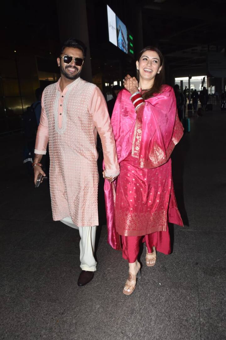 Paparazzi congratulated the couple and asked about their honeymoon plans, Hansika burst out laughing.