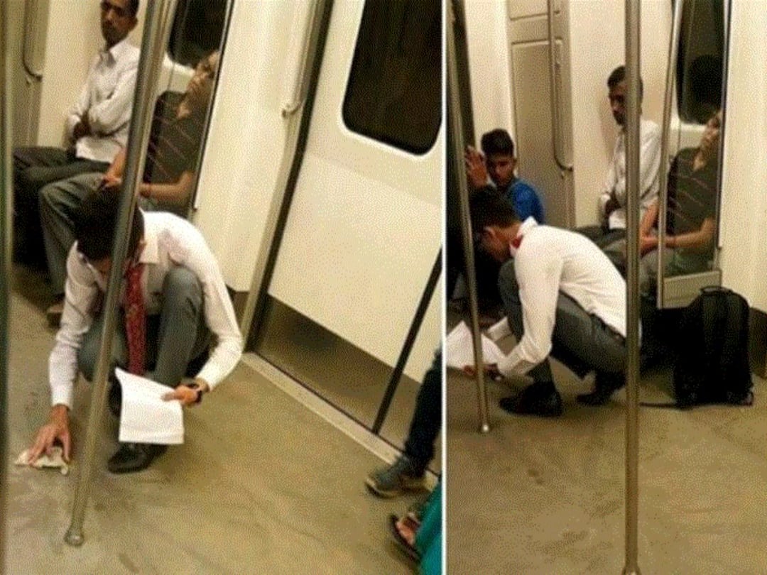 Young Man Cleans Spilled Food From Delhi Metro Floor, Netizens Hail His Sense Of Responsibility Young Man Cleans Spilled Food From Delhi Metro Floor Netizens Hail Sense Of Responsibility Young Man Cleans Spilled Food From Delhi Metro Floor, Netizens Hail His Sense Of Responsibility