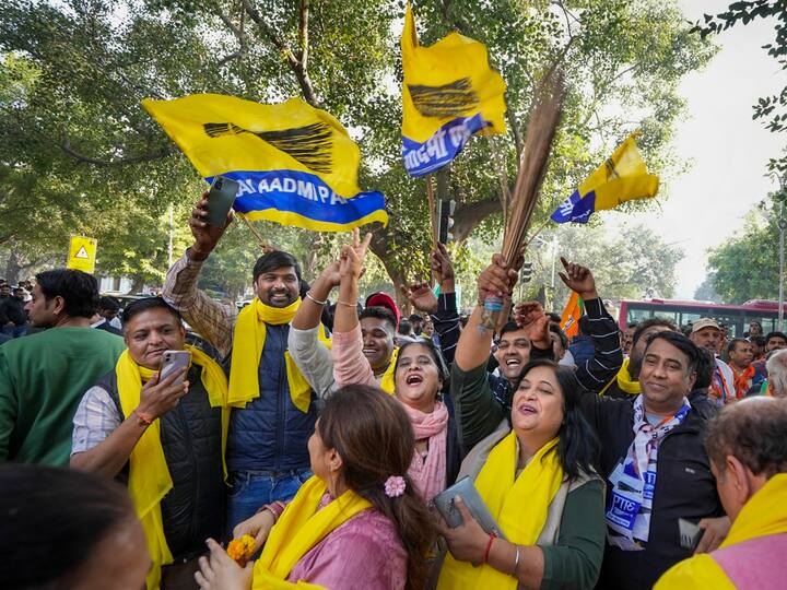 Hoardings reading 'acche honge 5 saal, MCD mein bhi Kejriwal (next five years will be good as Kejriwal has come in the MCD)' lined the street outside the AAP office as supporters revelled to the AAP's official poll song 'MCD mein Arvind Kejriwal'. (Source: PTI)
