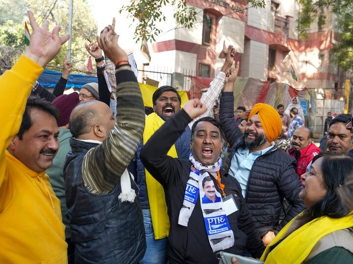 AAP offices across Delhi saw massive celebrations, with supporters dancing to dhol beats, and kids dressed as Delhi Chief Minister Arvind Kejriwal posing for photos. (Source: PTI)