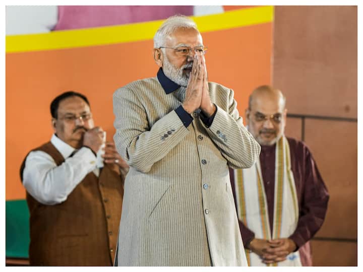 Prime Minister Narendra Modi, BJP President JP Nadda addressed the BJP workers at the party headquarters in New Delhi after the saffron party registered a landslide win in Gujarat Assembly elections on Thursday. Union Home Minister Amit Shah and Defence Minister Rajnath Singh were also present on the occasion. (Image: PTI)