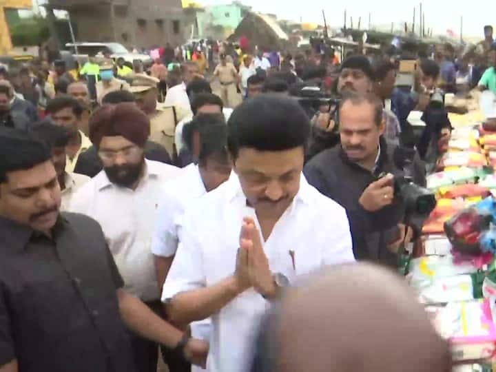 Tamil Nadu CM MK Stalin distributed flood relief-material and food to people affected by the Cyclone Mandous  in the Kasimedu area of Chennai. (Source: ANI)