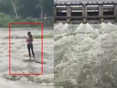 மணிமுக்த்தா அணையில் திறந்து விடப்பட்ட நீர்...ஆற்றின் நடுவே சிக்கிய கல்லூரி மாணவன்..!