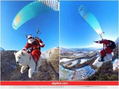 सांता क्लॉज और कुत्ते की पैराग्लाइडिंग का वीडियो हो रहा वायरल, आपने देखा?