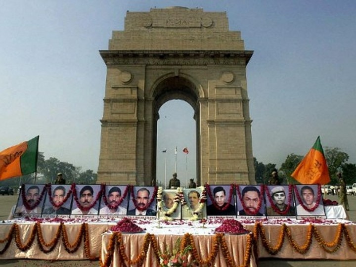 Portraits of Indian security members killed during the terrorist attack. Image Source: AFP 