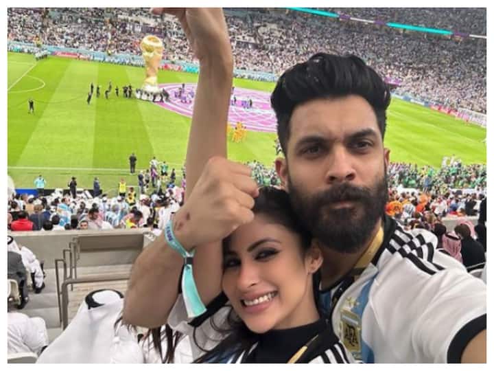 Mouni Roy and her husband Suraj Nambiar rooted for Lionel Messi and team Argentina at one of the FIFA World Cup matches. (Image: Instagram)