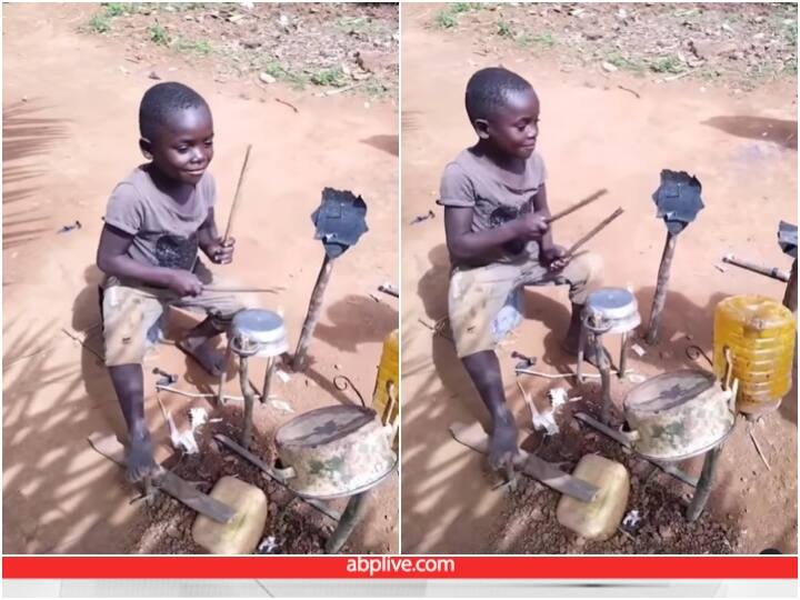 little boy playing drums made with scrap and empty vessels Video: कबाड़ और खाली बर्तन से ड्रम बजाता दिखा बच्चा, जुगाड़ कर देगा हैरान