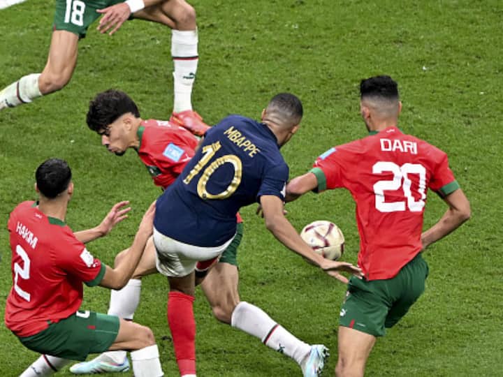 #10 of France, Kylian Mbappe went head to head with Morocco's players while trying to dominate the field. (Image Source: Getty)