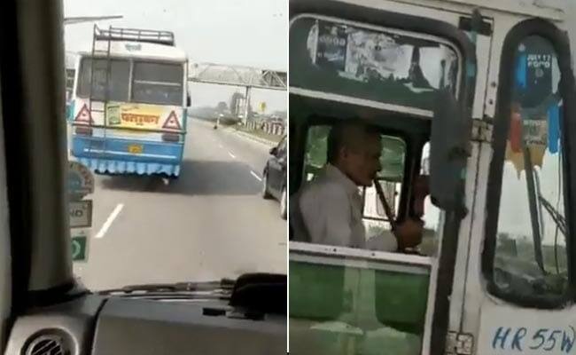 Viral Video: ਇੱਕ ਹੱਥ ਵਿੱਚ ਹੁੱਕਾ ਅਤੇ ਦੂਜੇ ਹੱਥ ਨਾਲ ਸਟੀਅਰਿੰਗ ਨੂੰ ਮੋੜਦੇ ਹੋਏ ਤਾਊ ਨੇ ਹਰਿਆਣਾ ਰੋਡਵੇਜ਼ ਦੀ ਬੱਸ ਨੂੰ ਭਜਾਇਆ! Haryana roadways driver smokes hookah while driving bus caught on camera Viral Video: ਇੱਕ ਹੱਥ ਵਿੱਚ ਹੁੱਕਾ ਅਤੇ ਦੂਜੇ ਹੱਥ ਨਾਲ ਸਟੀਅਰਿੰਗ ਨੂੰ ਮੋੜਦੇ ਹੋਏ ਤਾਊ ਨੇ ਹਰਿਆਣਾ ਰੋਡਵੇਜ਼ ਦੀ ਬੱਸ ਨੂੰ ਭਜਾਇਆ!