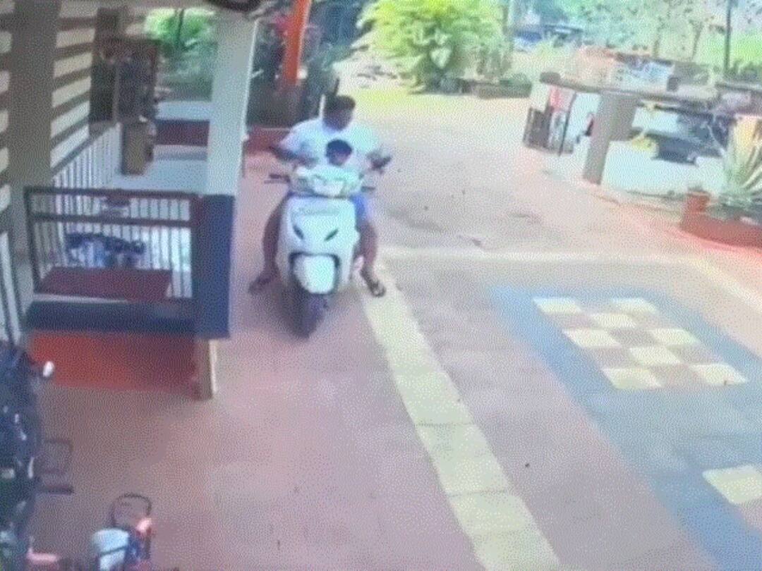 Man Leaves Ignition Of Scooty On With Child Standing On Its Leg Space Watch What Happens next Man Leaves Ignition Of Scooty On With Child Standing On Its Leg Space - Watch What Happens next