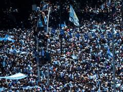 FIFA 2022: Lionel Messi And Argentina World Cup Heroes Airlifted As Fans Swarm Victory Parade Bus — See Pics