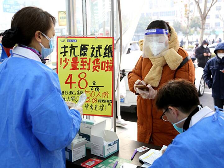 As China grapples with a surge in Covid-19 cases, people are scrambling to buy fever medicines and painkillers to alleviate flu-like symptoms, resulting in serpentine queues outside pharmacies.