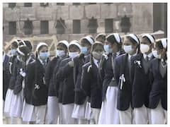 School Students Wear Face Masks As Covid-19 Fear Grips Country. IN PICS
