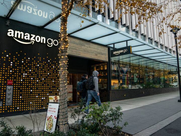 Amazon - The e-commerce giant is reportedly planning to lay off nearly 10,000 people in corporate and technology jobs towards the end of this year. It has already announced a pause on its corporate hiring. [Image Credit: Getty]