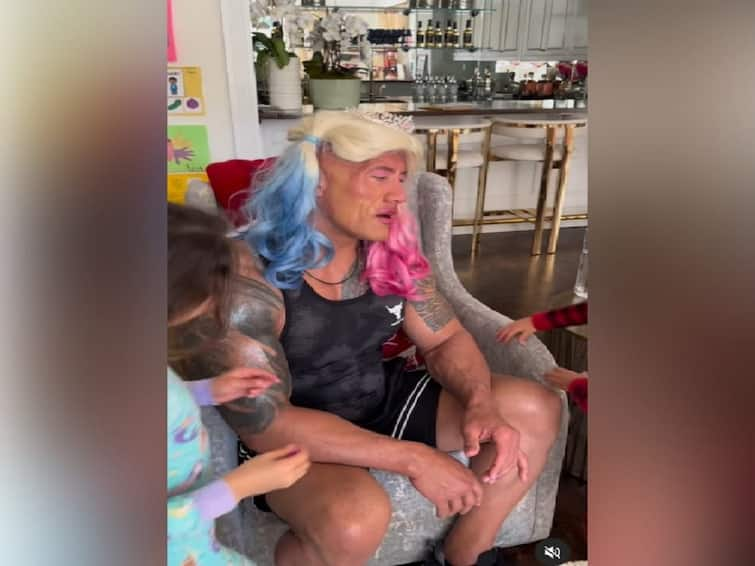 WATCH Dwane 'The Rock' Johnson Gets Christmas Makeover From His Daughters WATCH: Dwayne 'The Rock' Johnson Gets Christmas Makeover From His Daughters