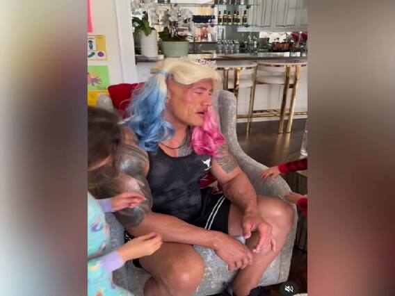 WATCH: Dwayne 'The Rock' Johnson Gets Christmas Makeover From His Daughters