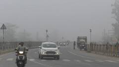 In Pics: भरतपुर में घने कोहरे ने रोकी वाहनों की रफ्तार, कड़ाके की ठंड ने लोगों को किया घरों में कैद