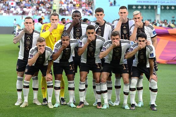 The players of Germany covered their mouths in their team photo in protest for FIFA’s ban of the ‘OneLove’ armband prior to their World Cup opener against Japan at Khalifa International Stadium on November 23, 2022 in Doha, Qatar. Ahead of their match, all Germany players made the gesture in front of dozens of photographers on the field. Pic Courtesy: AFP