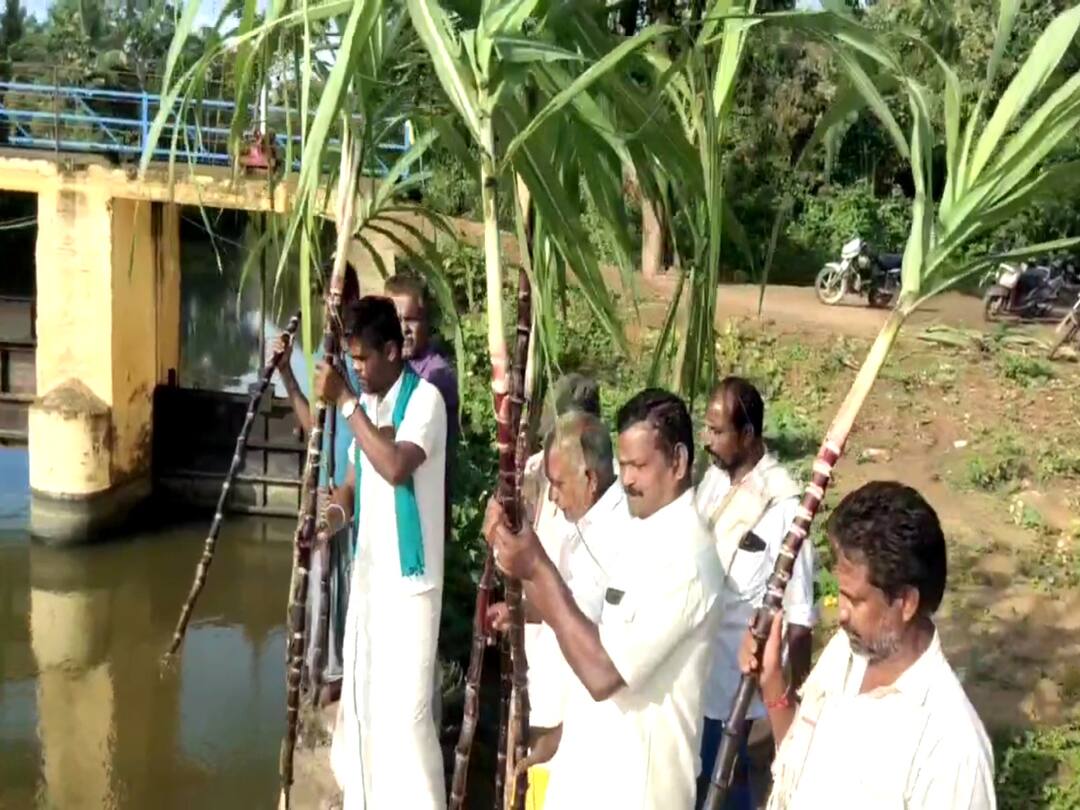 கரும்பில் கருப்புத்துணி, கையில் மண்சட்டி - மயிலாடுதுறை கரும்பு விவசாயிகள் போராட்டம்.