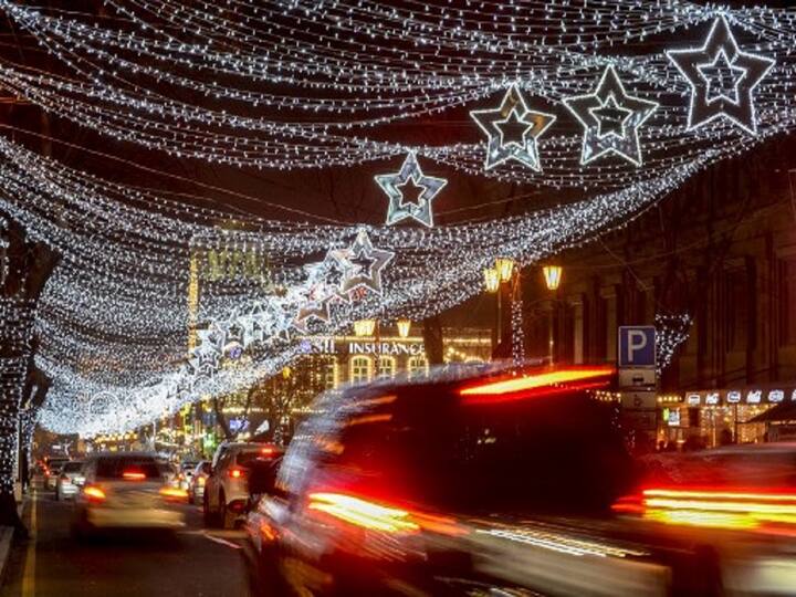 Cars drive by Christmas and New Year's light displays in Yerevan, Armenia. Armenia's capital, Yerevan, is distinguished by majestic Soviet-era architecture. The main road is dominated by the Matenadaran library, which has thousands of ancient Greek and Armenian manuscripts. (Image Source: AFP)