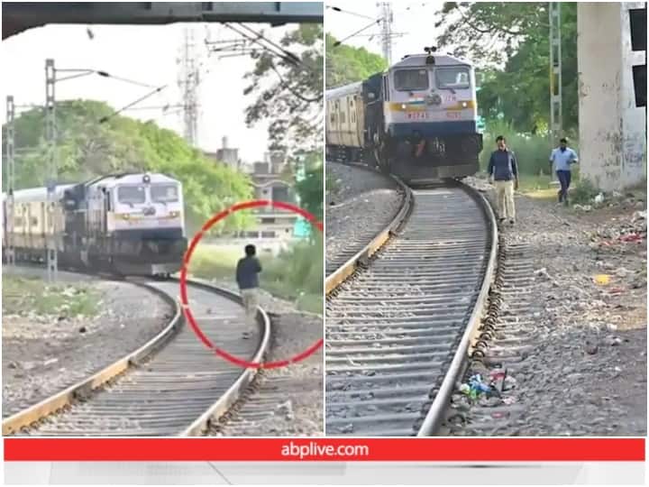 man trying to stop a speeding train while standing on the tracks has gone viral Viral Video: ट्रेन रोकने की कोशिश कर रहे शख्स को लोको पायलट ने जड़ा थप्पड़, वायरल हो रहा वीडियो