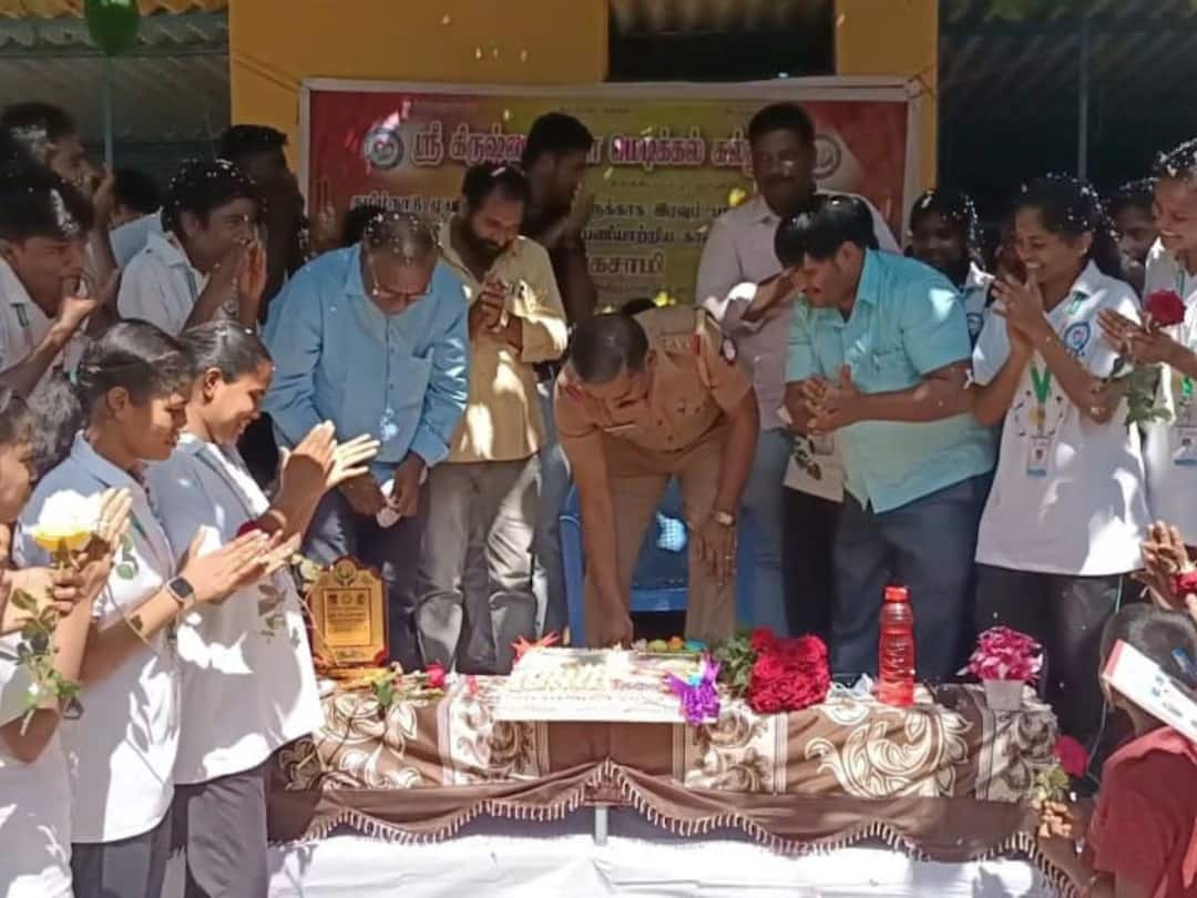 The students gave a pleasant surprise by cutting a cake and congratulating the police inspector who came to inaugurate the sports competition near Dharmapuri காவல் ஆய்வாளரின் பதவி உயர்வு.. கேக் வெட்டி இன்ப அதிர்ச்சி கொடுத்த மாணவ, மாணவிகள்..