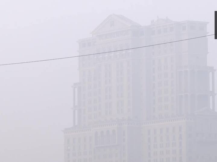 Here's a visual showing Kolkata engulfed in smog as a building is barely visible. (Image Source: ANI)