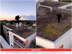 शख्स ने ऊंची इमारत की छत से लगाई हैरतअंगेज छलांग, यूजर्स बोले- खतरों का खिलाड़ी