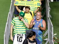 Last Tribute to Pele: पेले के आखिरी दीदार के लिए उमड़ पड़े फैंस, तस्वीरों में देखें लीजेंड फुटबॉलर की अंतिम विदाई