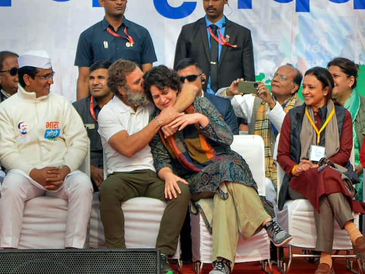 Rahul Gandhi was seen affectionately hugging Priyanka and even kissed her on the cheek during the ceremony at the Loni border. They later walked hand in hand during the yatra in Uttar Pradesh and waved to the ecstatic crowd. (Source: PTI)