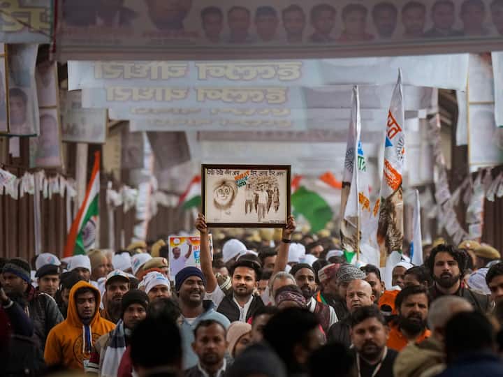 Congress supporters during the Bharat Jodo Yatra at Yamuna old bridge. (Image Source: PTI)
