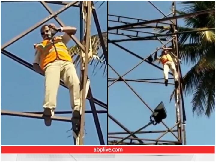 traffic policeman from Bengaluru climbing a hoarding to save a pigeon Video: कबूतर को बचाने के लिए बेंगलुरु पुलिस के जवान ने जान जोखिम में डाली, यूजर्स का जीता दिल